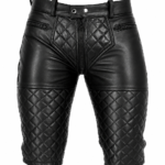 Front view of men's quilted black genuine leather biker shorts with diamond quilted panels and zipper pockets on a white background.